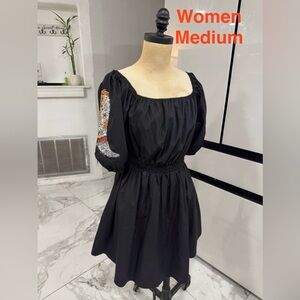 Elegant Black Dress with Sequin Detail